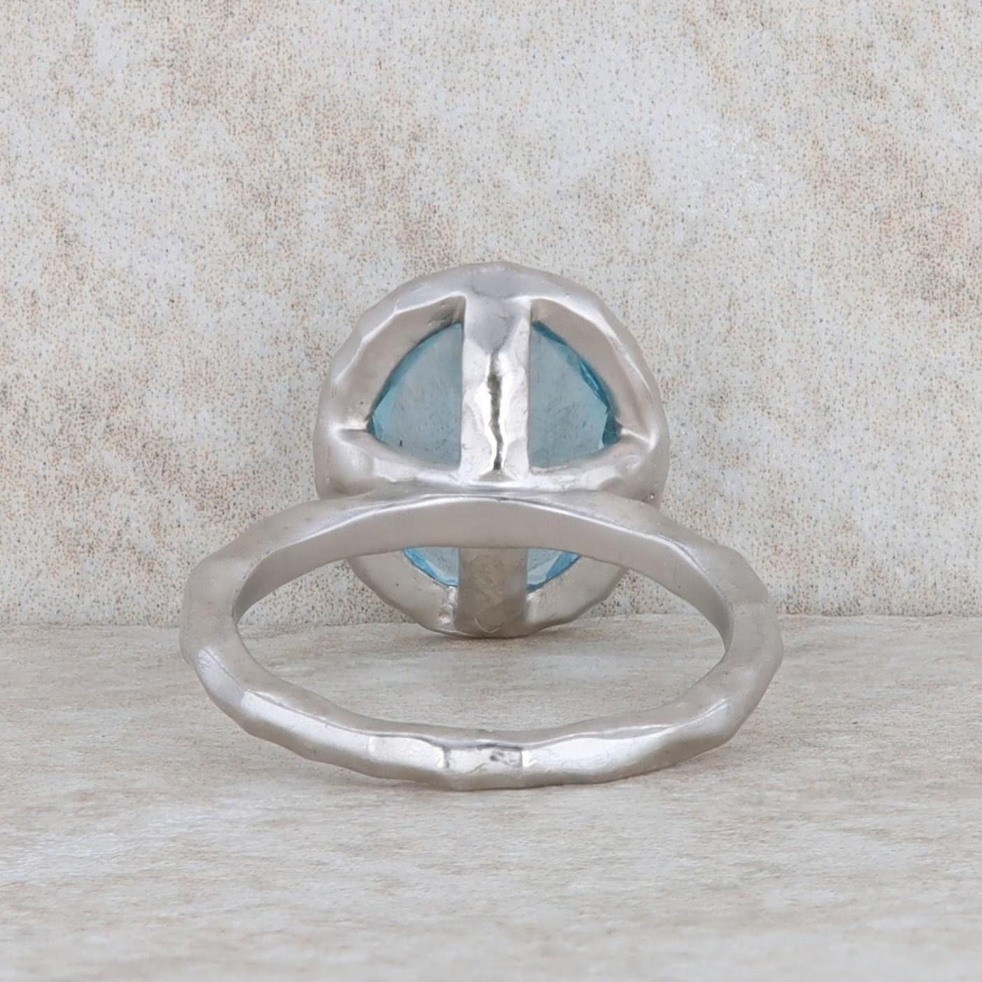 Sterling Silver Blue Topaz Ring with 2 Diamond Bands