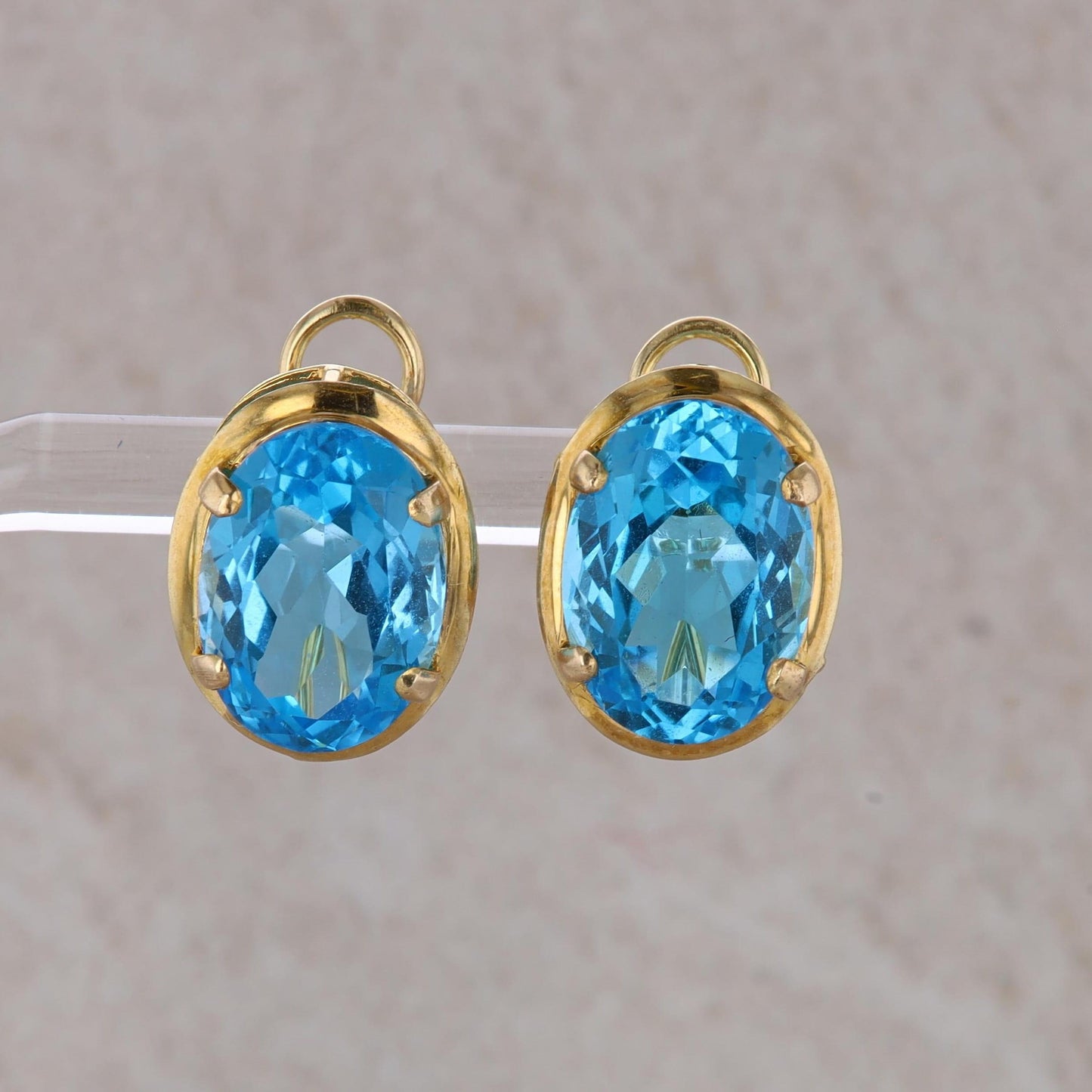 14k Yellow Gold Blue Topaz Oval Stud Earrings