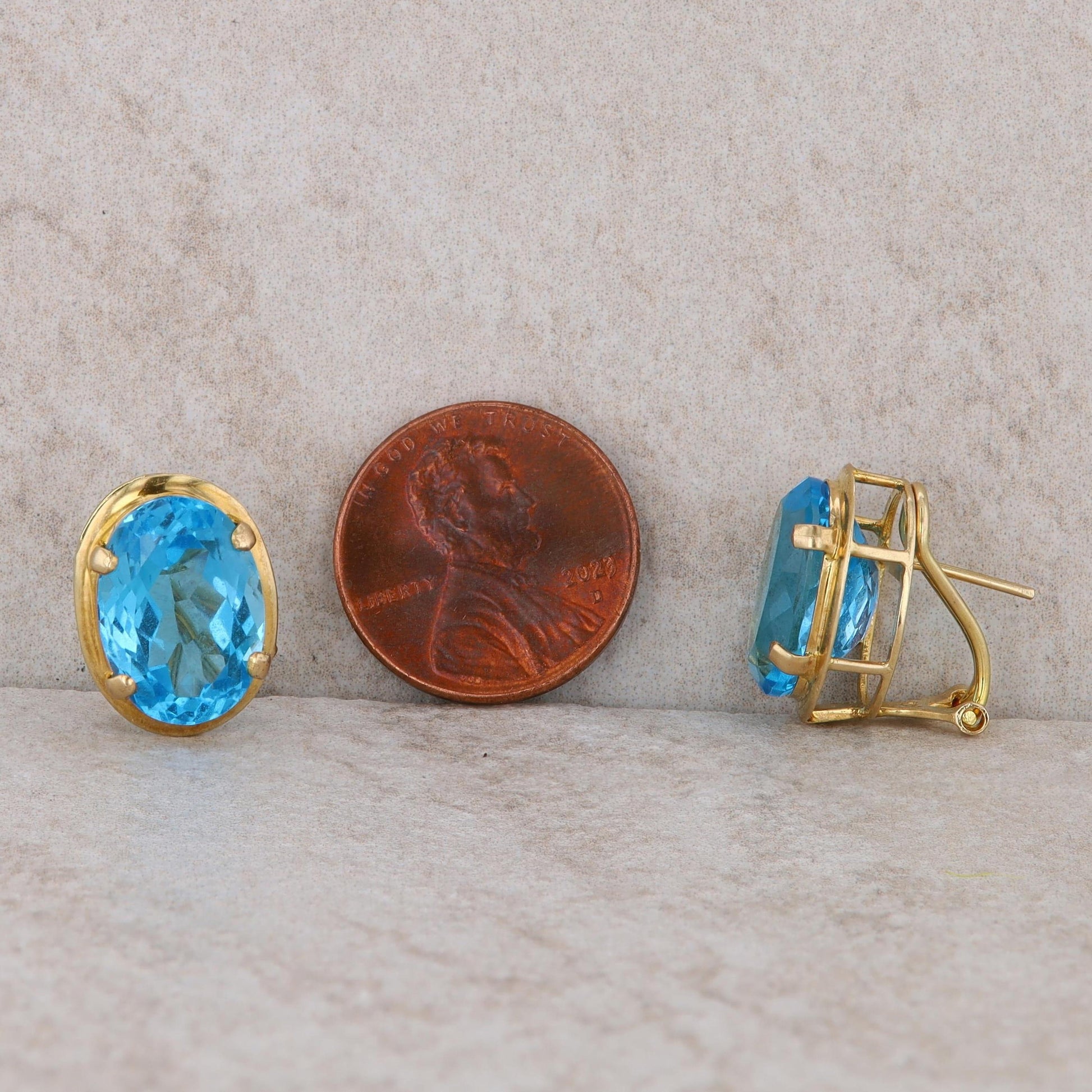 14k Yellow Gold Blue Topaz Oval Stud Earrings