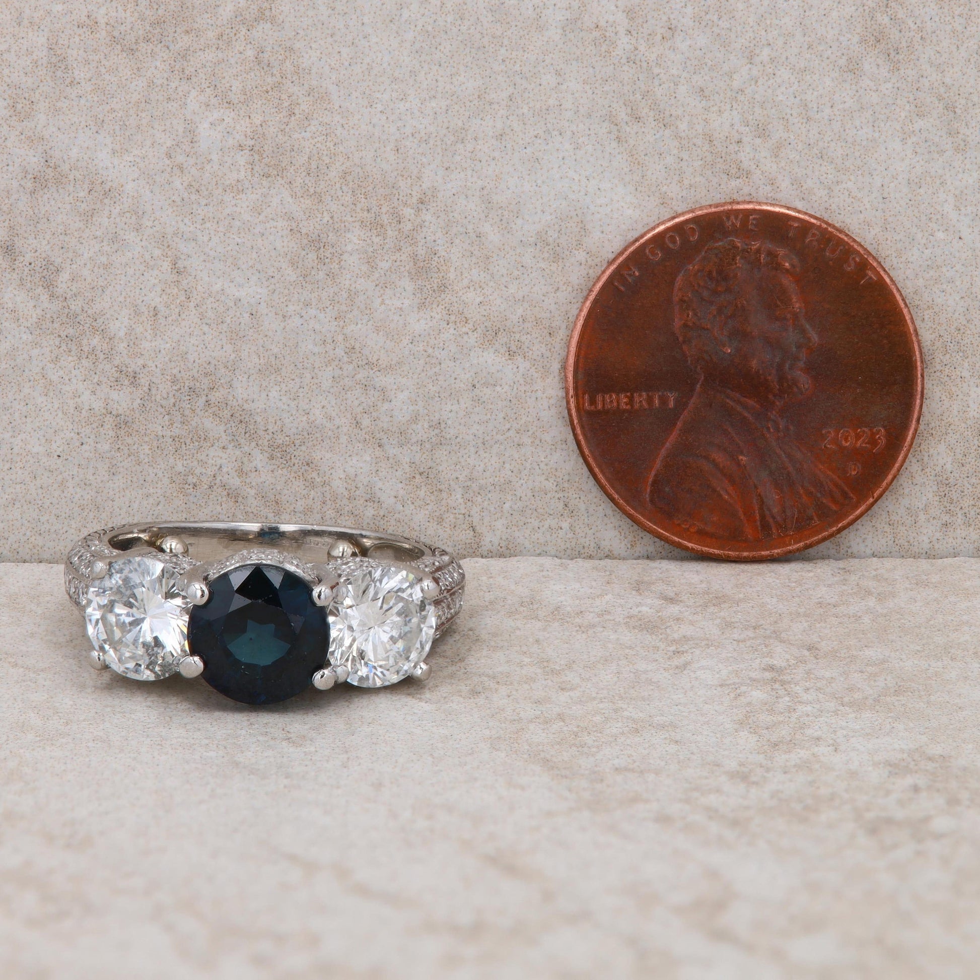 Platinum Sapphire and Diamond Three Stone Filigree Ring